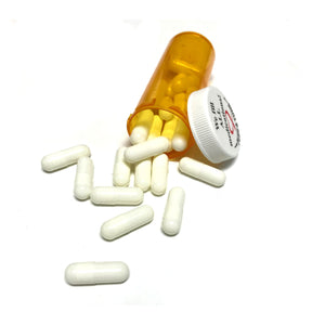Fake Medicine yellow, Green, White, Blue Pill Capsules in 16 Dram Amber Plastic Medicine Vial with Lid Props for television, photography, film or live theater.