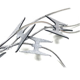 10ft Custom built razor wire replica safe for direct contact with actors. Comes in four different colors: silver, black, rusty, bloody