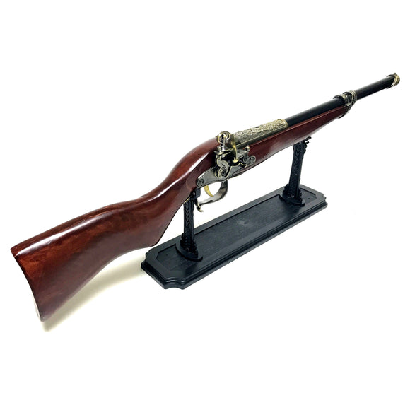 Detailed, lightweight prop gun features wood stock, moving flintlock hammer and trigger, and intricate details with brass finished parts