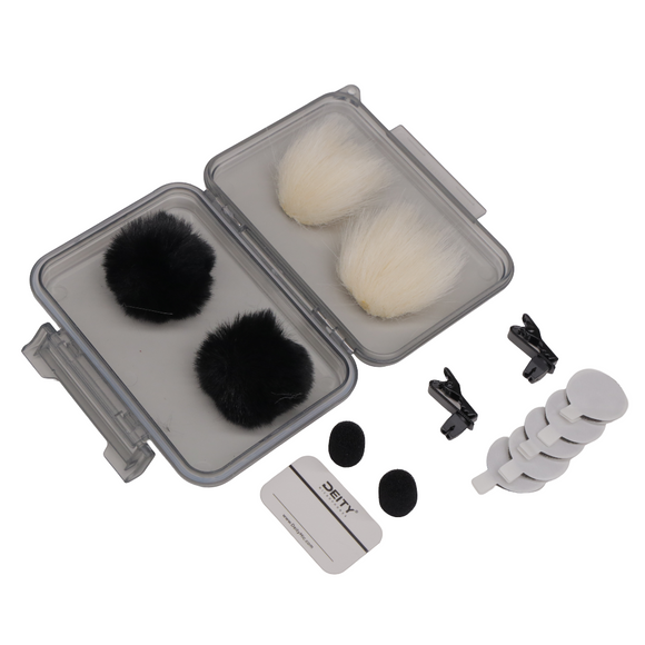 The Deity Deluxe Lavalier Accessory Kit comes with 2 Black Fluff Balls, 5 Disposable Adhesive Disk, 2 Mic Tie Clips, 2 Deluxe Foam Windscreens, and Weather Sealed Carrying Case available from Dependable Expendables Dallas Texas.