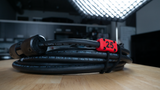 Grip Lab Red 25 foot Cord Cable Labels Sash Tie Holders clearly marking length runs for stingers used on set in video and film production - available at Dependable Expendables