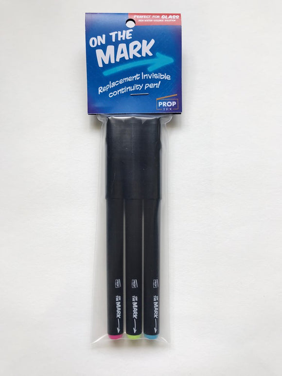 On The Mark three Invisible Ink Pen Marking System featuring yellow, pink and blue invisible (UV) Ink Pen Marking System to insure props are always in the exact place at the top of every scene.